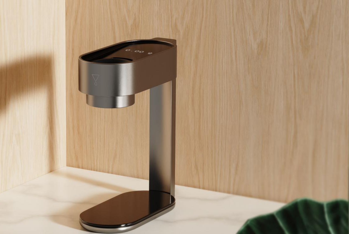 The FloMeasure countertop measuring instrument in a warm wood kitchen setting